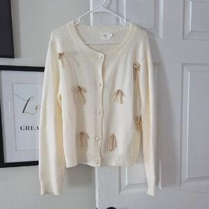 Cream Cardigan with Bow Accents